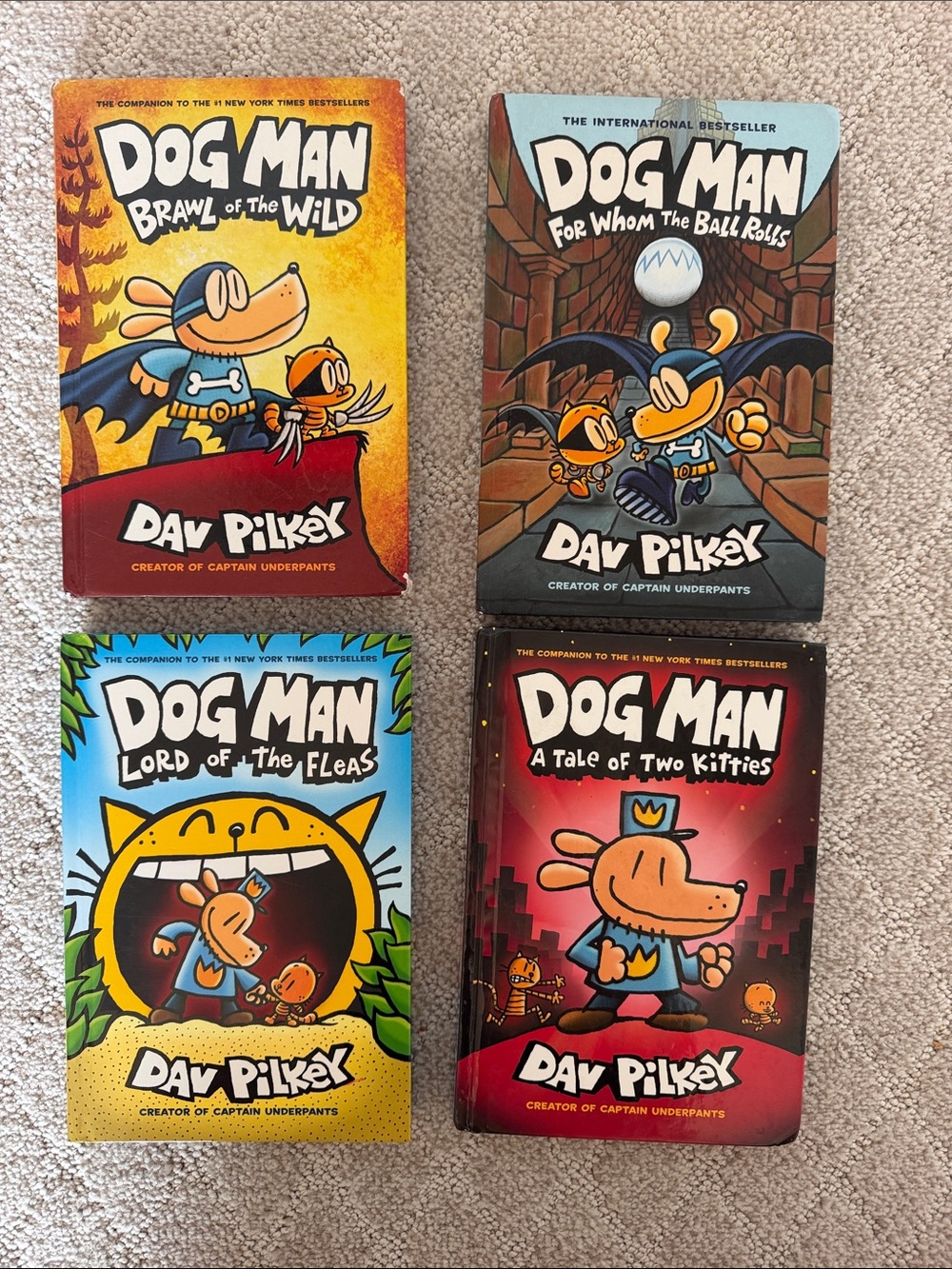Scholastic Dog Man 4-Book Set — Blue, Yellow, Red, Orange Covers